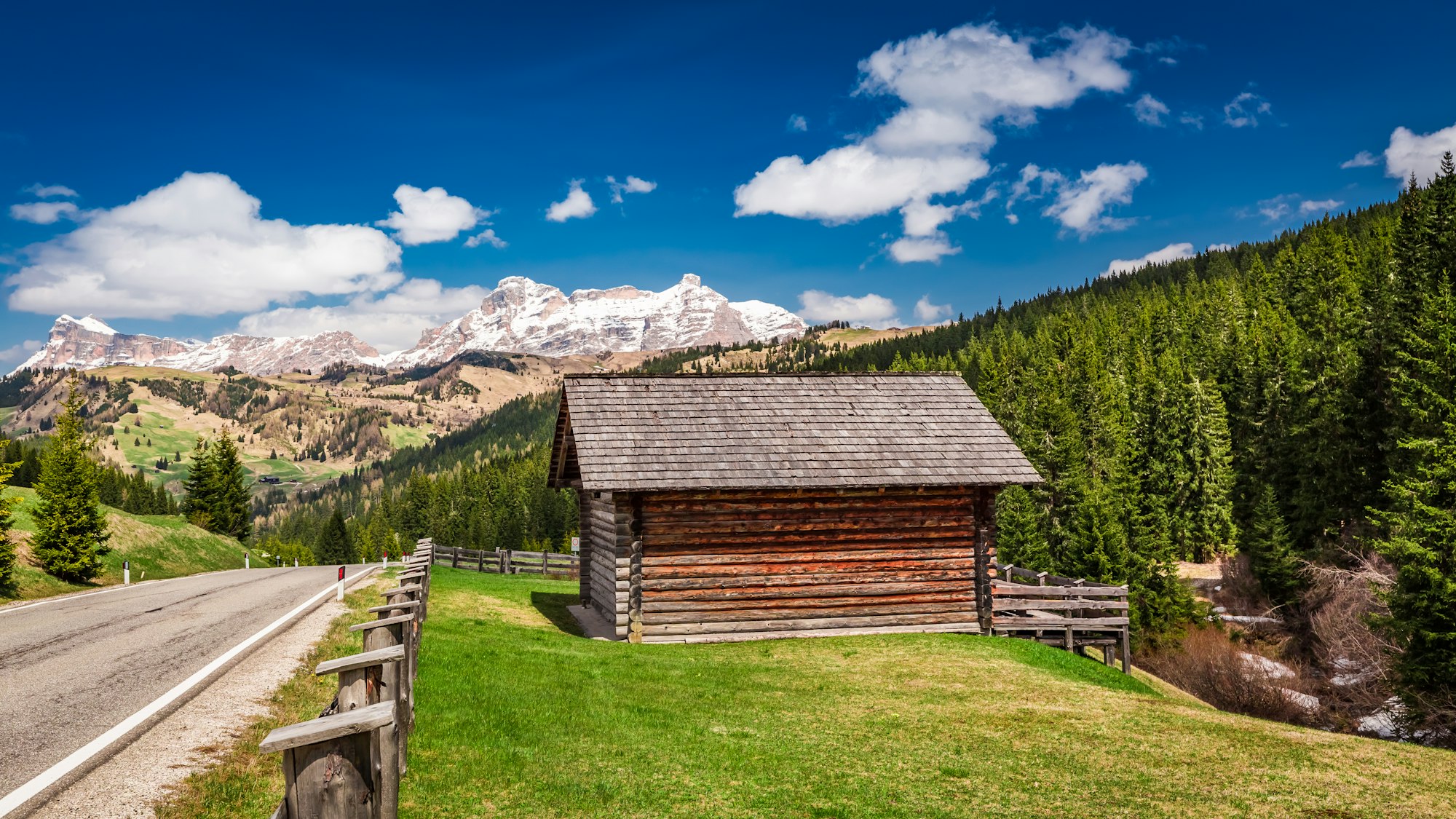 View of wooden cottage in Dolomites, Italy