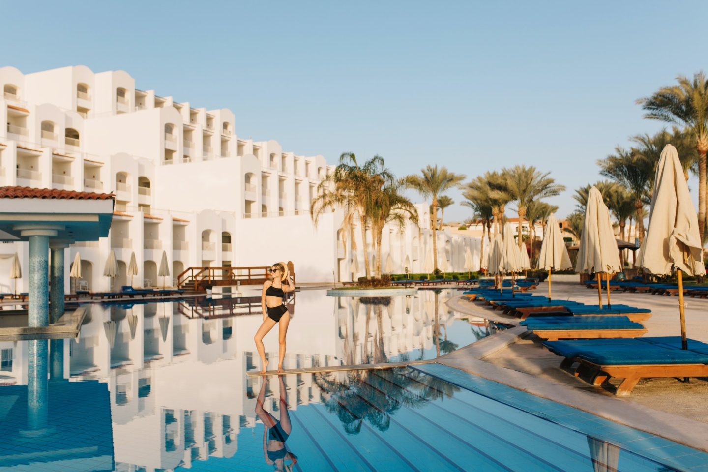 Luxury white hotel egypt, eastern style, resort with nice big pool.